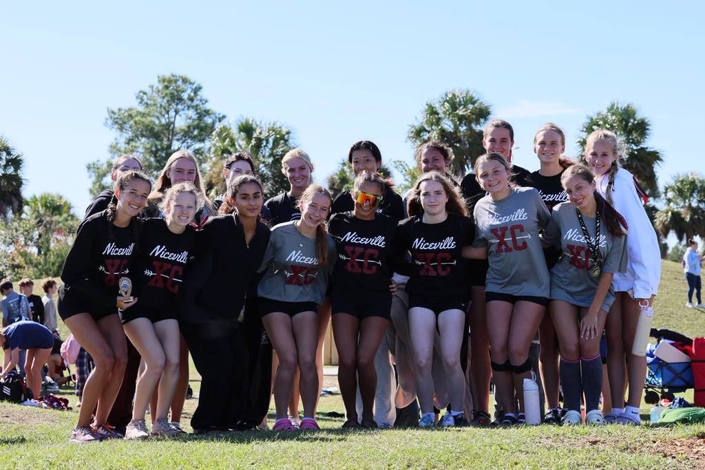 NHS Girls Cross Country  secured third place in the District