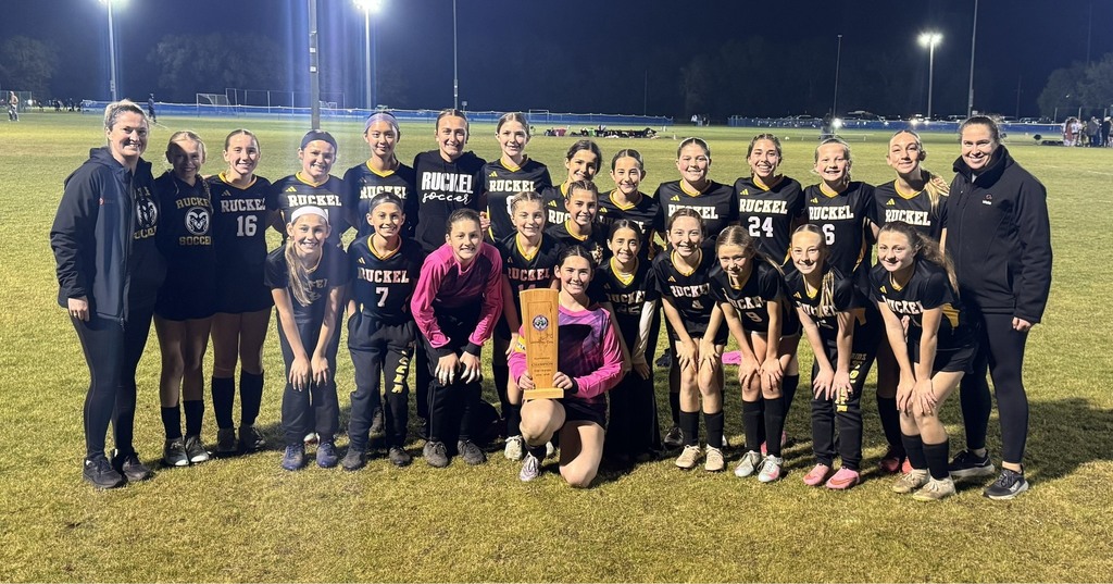 Ruckel MS Girls Soccer Team on field with trophy