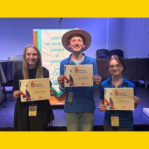 Leighton, Pearson, and Holly with their certificates from the Civics Bee. 