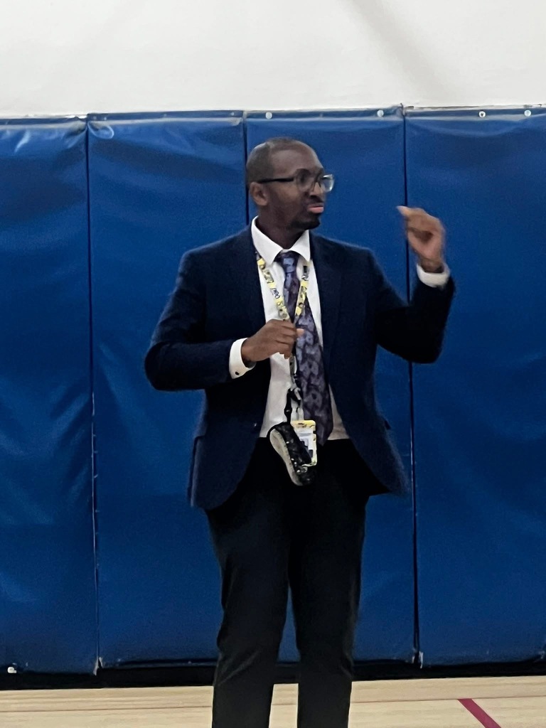 Mr. Jasper, Richbourg School’s music teacher is leading the school’s chime group performance at graduation. 