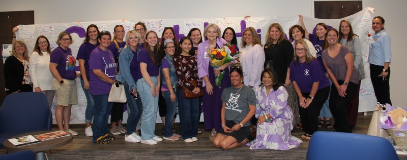 Dr. Kelley at SB meeting with family, friends, and co-workers.