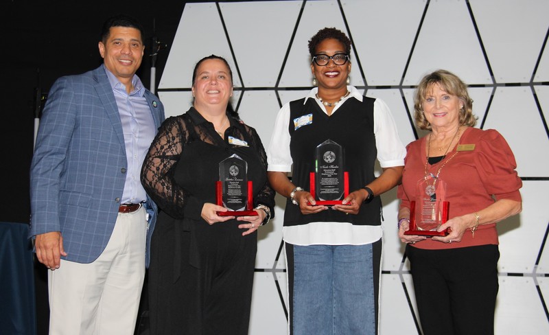 (Pictured L to R: Superintendent Marcus Chambers, Gretchen Levinson, Nicole Hardin, and Starla Lucas)