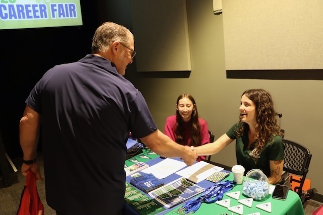 J Spolski thanking vendors at the college and career fair