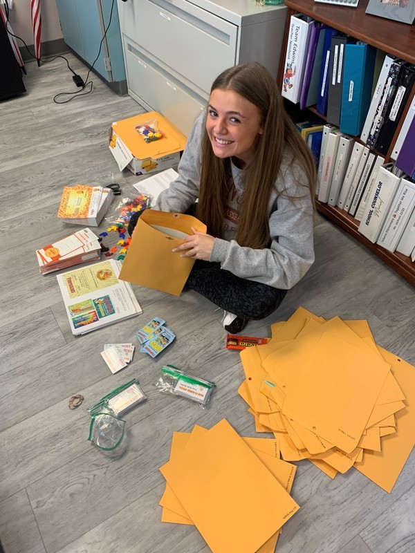 Being a high school helper makes Ashley Bouck, “feel good about helping out teachers, counselors, and students.” Being a high school helper makes Ashley Bouck, “feel good about helping out teachers, counselors, and students.”