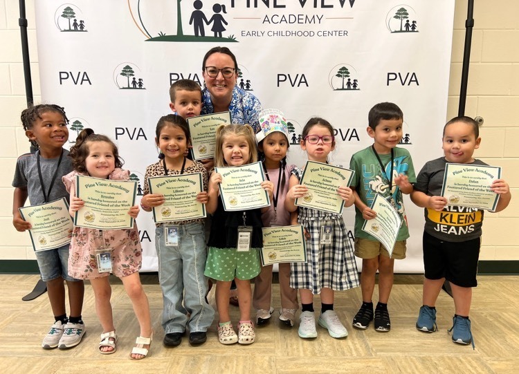 group of students of the week with principal