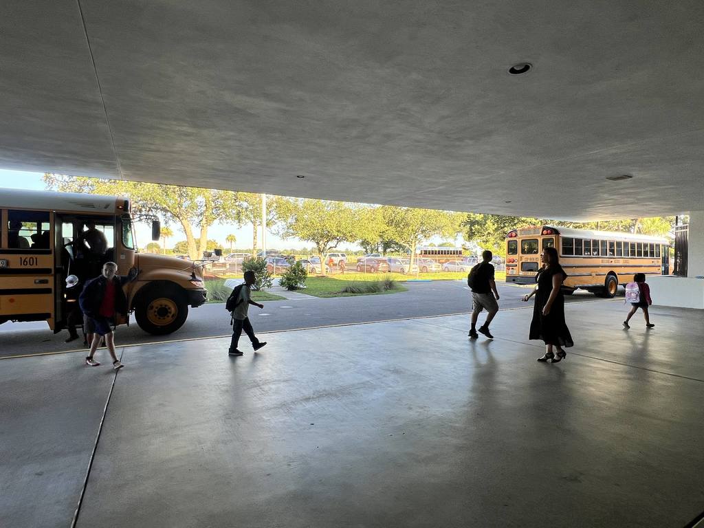 Students unloading off the bus