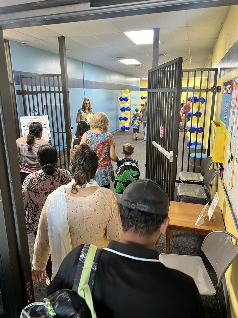 Parents walking in with students