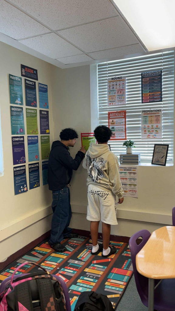 Two students doing activity in English classroom