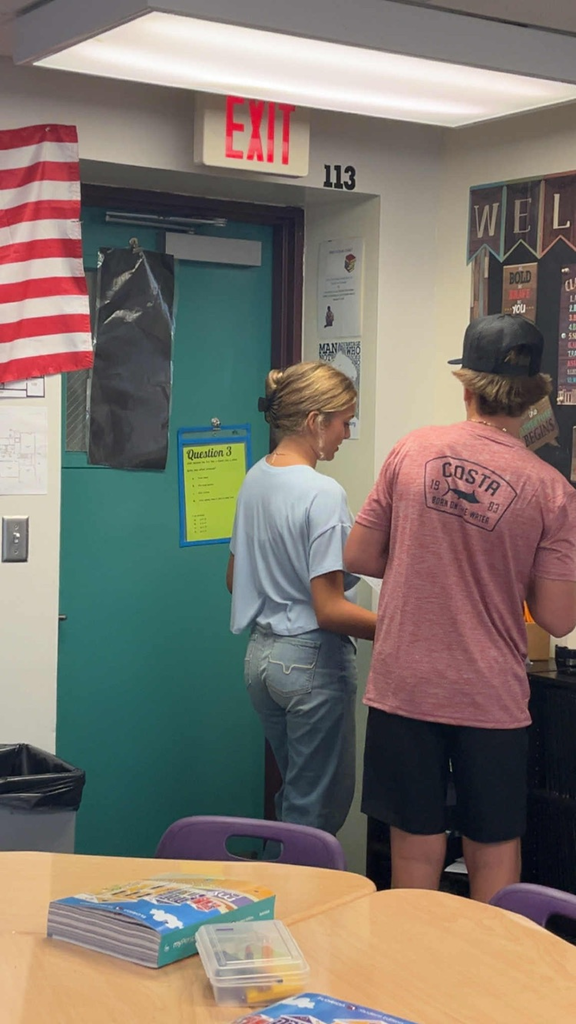 Two students doing activity in English classroom