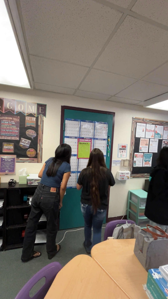 Two students doing activity in English classroom