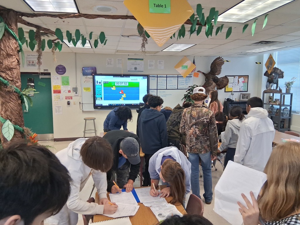 students working on scavenger hunt for science syllabus