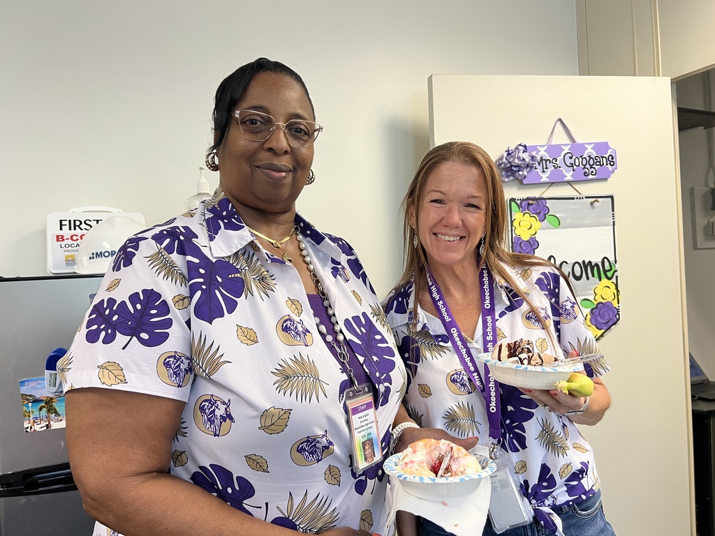 two teachers showing banana split