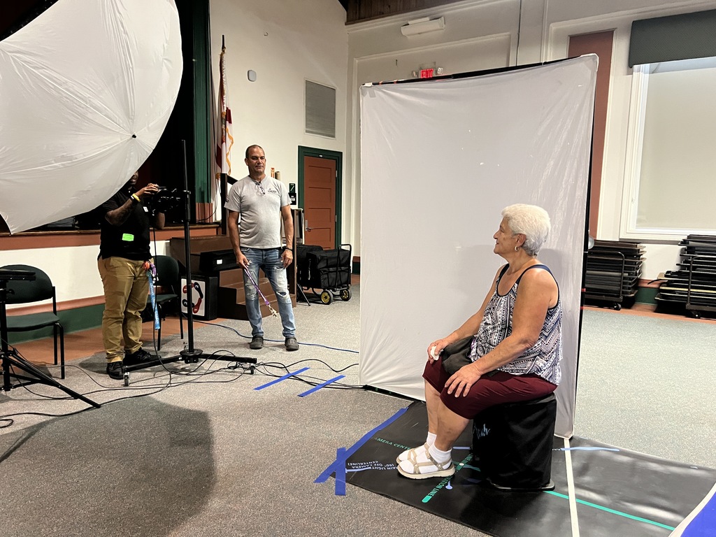 two custodians taking their school picture with lifetouch