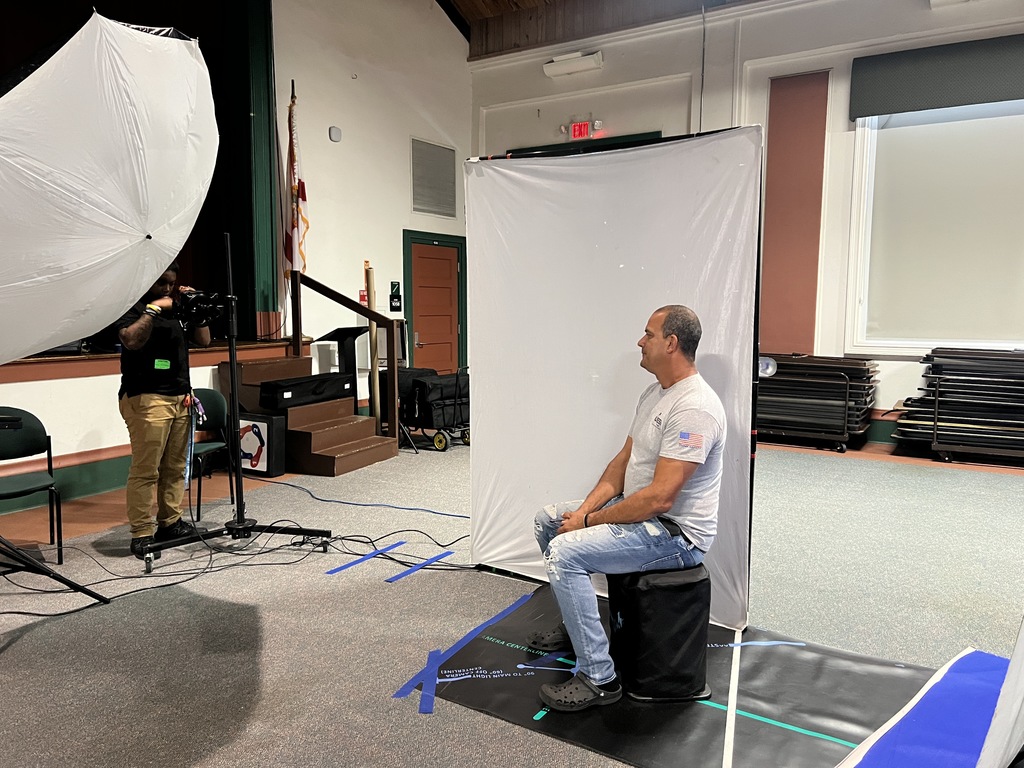 two custodians taking their school picture with lifetouch