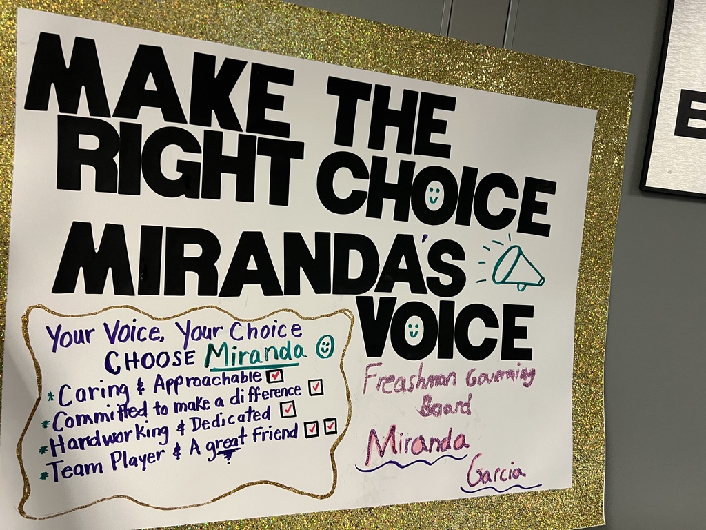 governing board posters hung in hallway