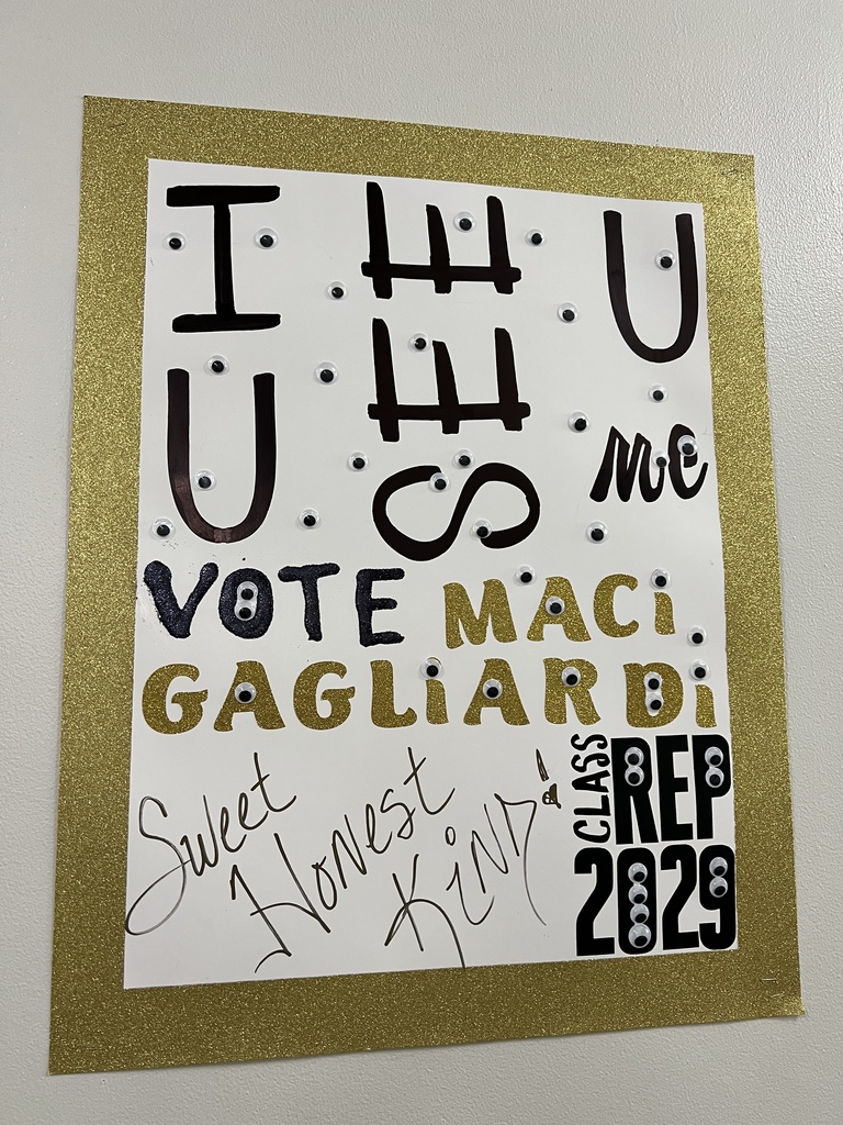 governing board posters hung in hallway