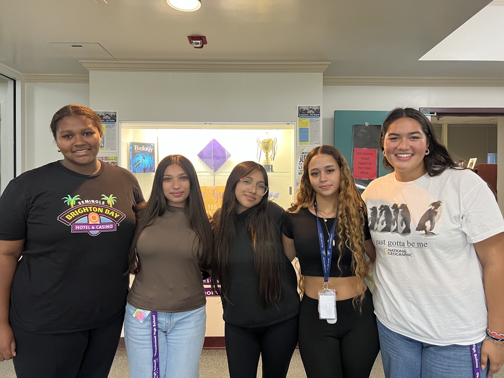 students standing by main office