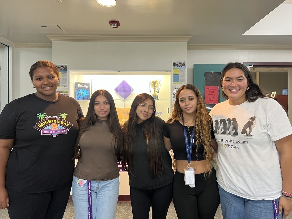students standing by main office
