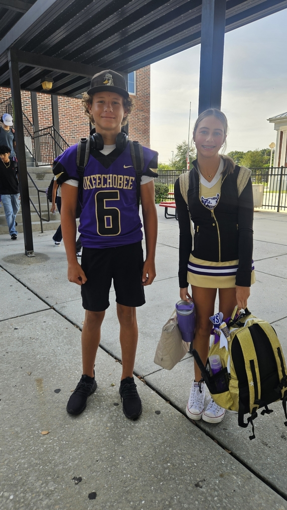 football player with cheerleader