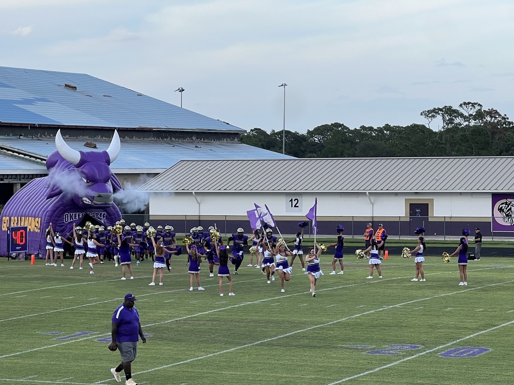 football players at Okeechobee high school field