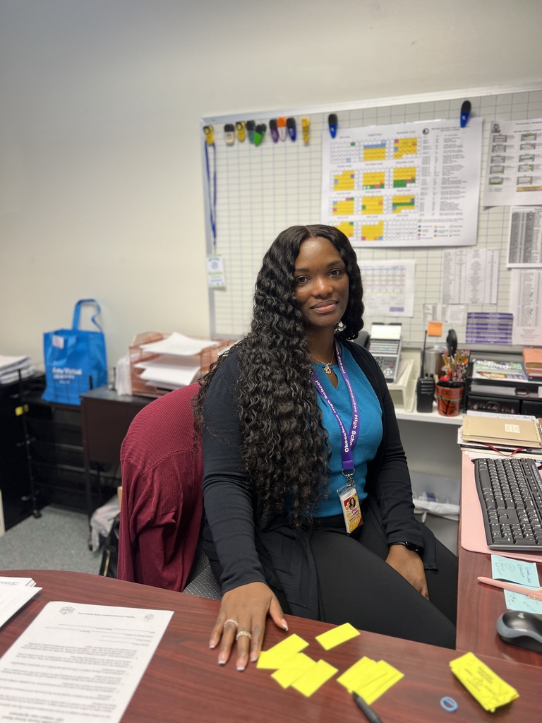 guidance counselor sitting down in her office 