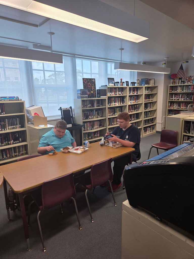 students visiting the library during lunch