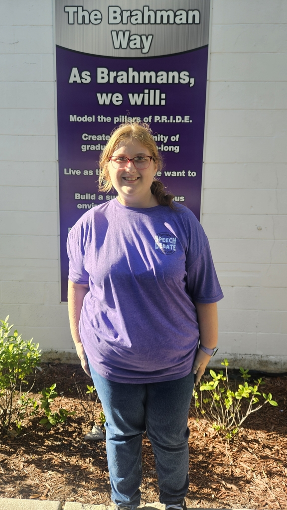 student wearing debate shirt