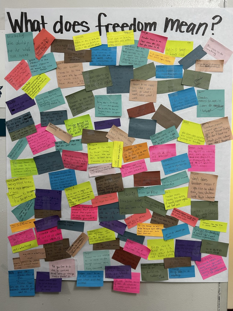 what does freedom mean poster with sticky notes all over it