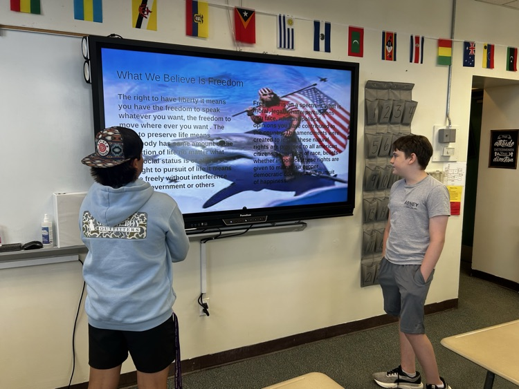 two students presenting for celebrate freedom week