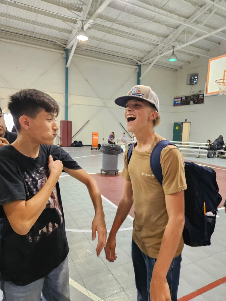 two boys playing in gym