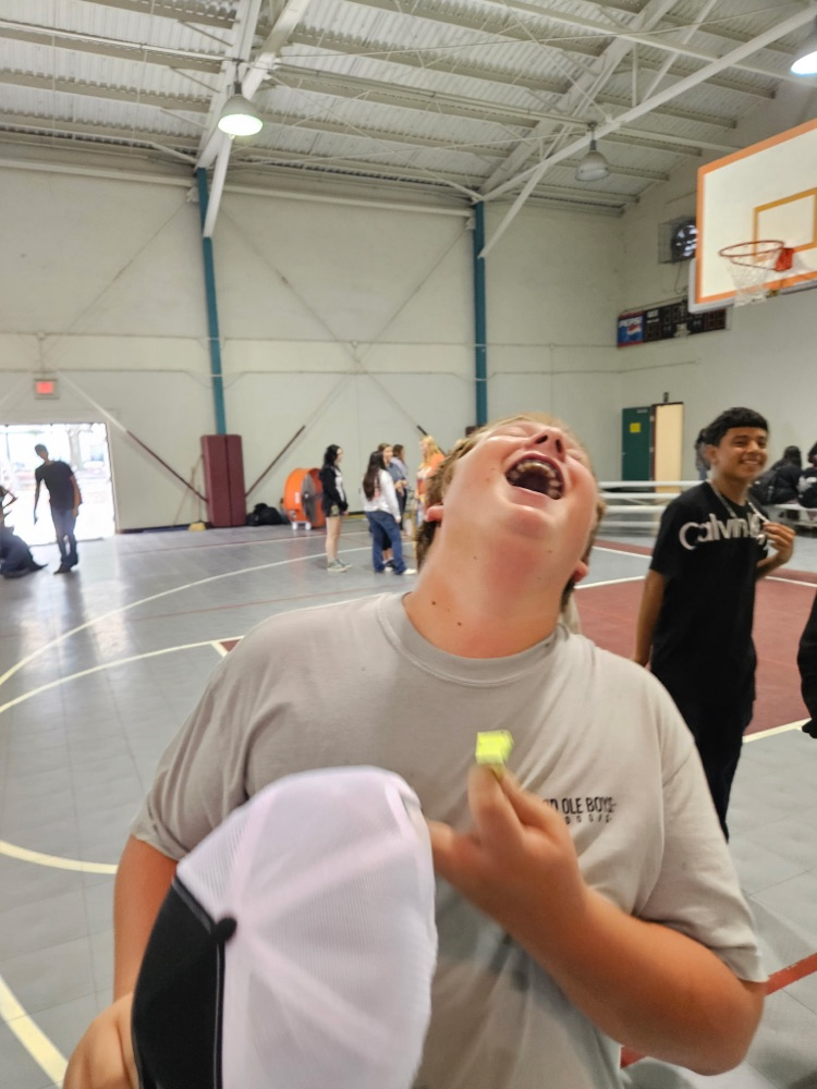 boy laughing playing homecoming game