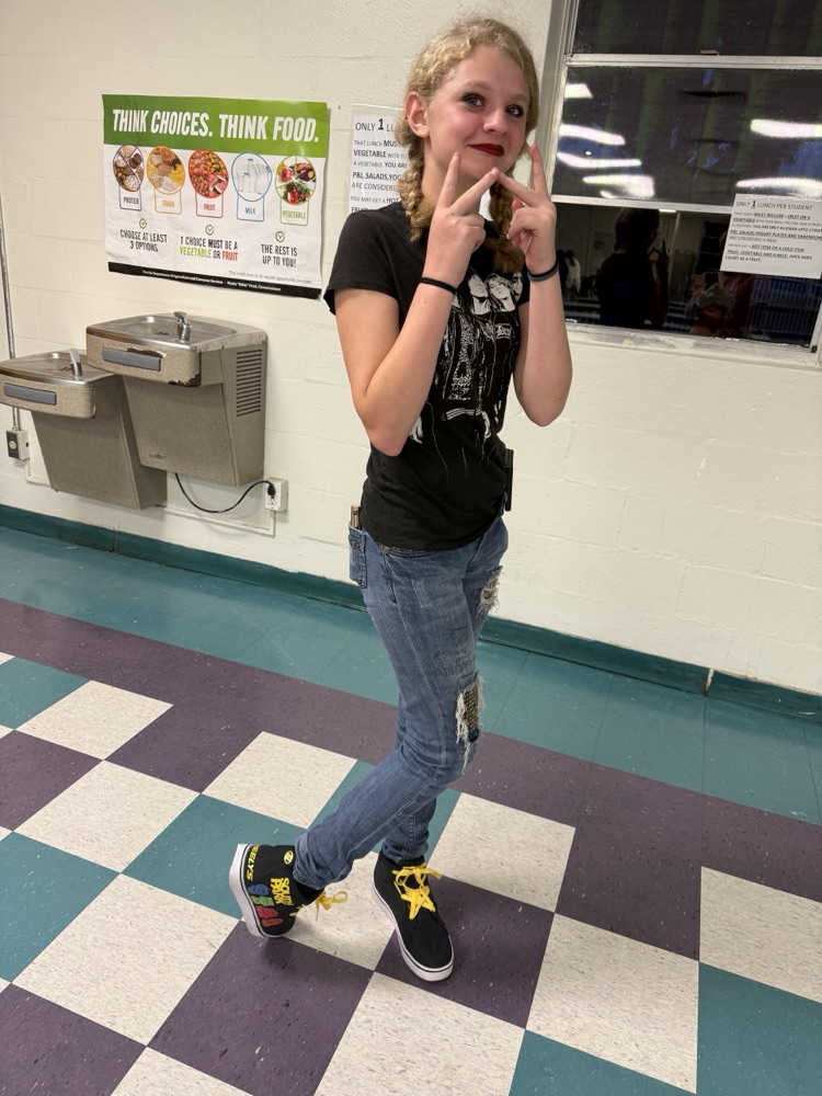 student dressed as parents for homecoming 