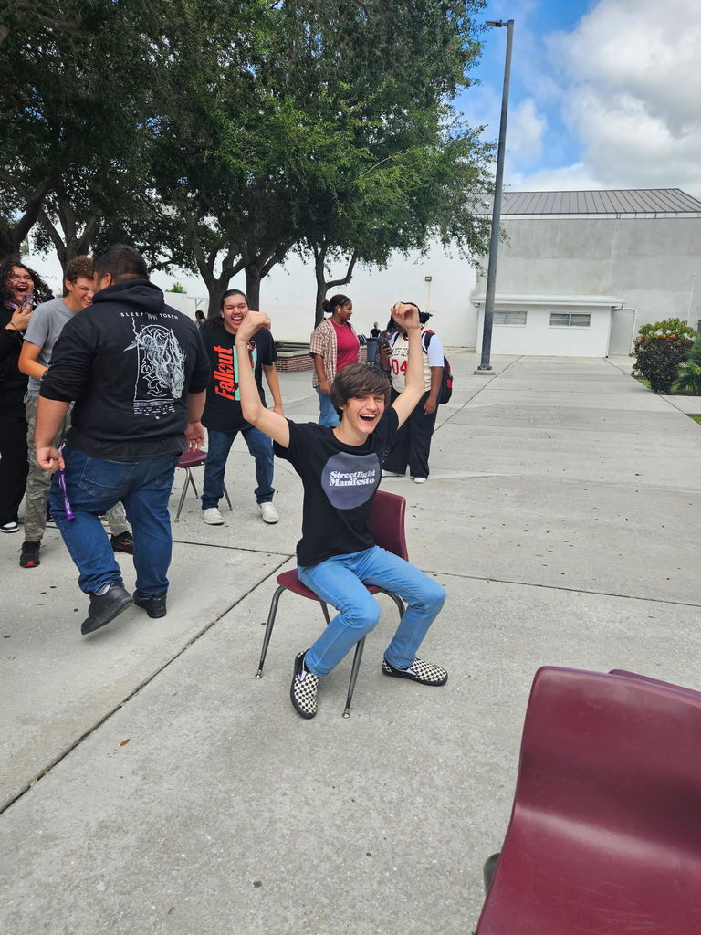 musical chairs winner in courtyard