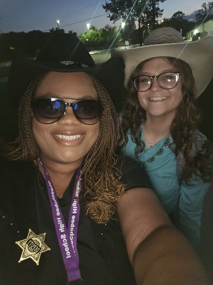 principal and student dressed for Wild West 