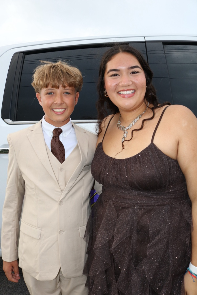 escort and homecoming court waiting for parade
