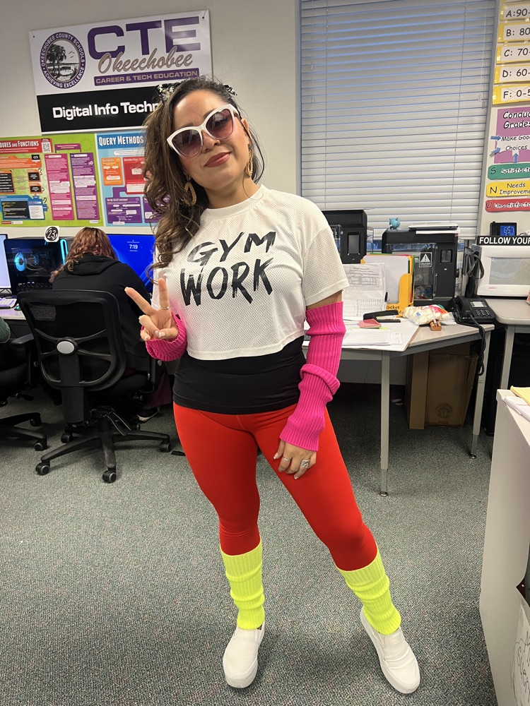 digital tech teacher dressed for the 80s for homecoming week