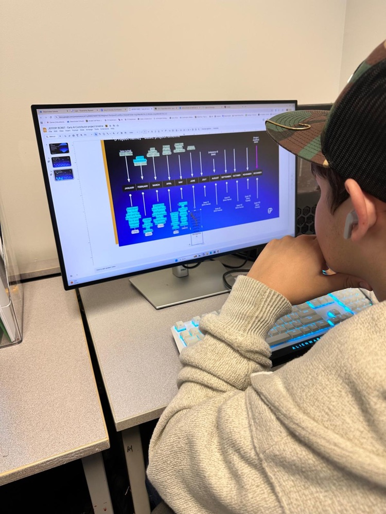 student looking at computer