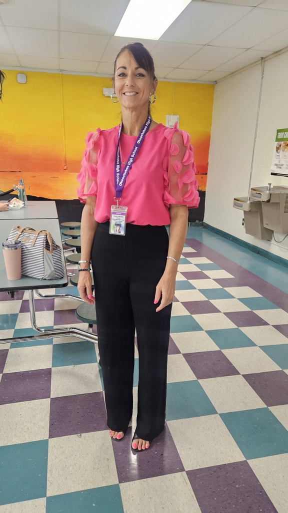 teacher wearing pink