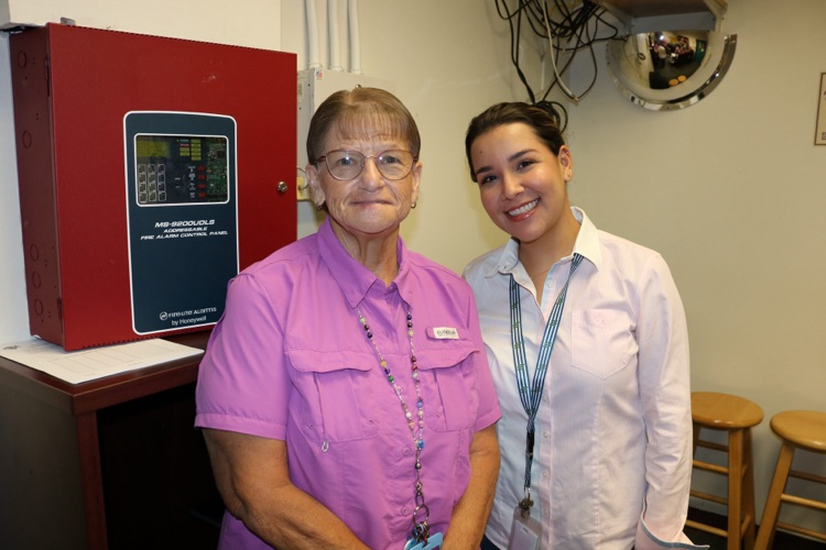 teacher and office staff wearing pink