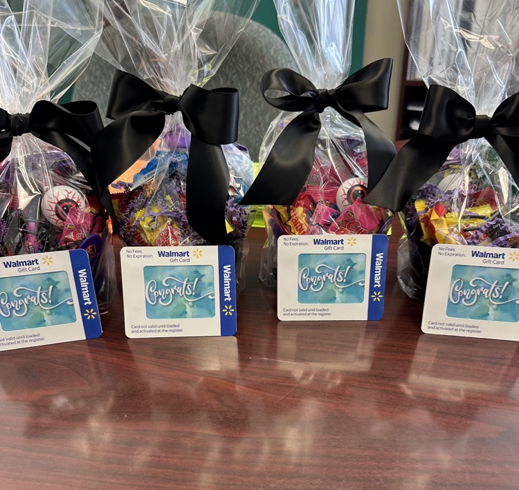 four gift baskets for attendance prizes