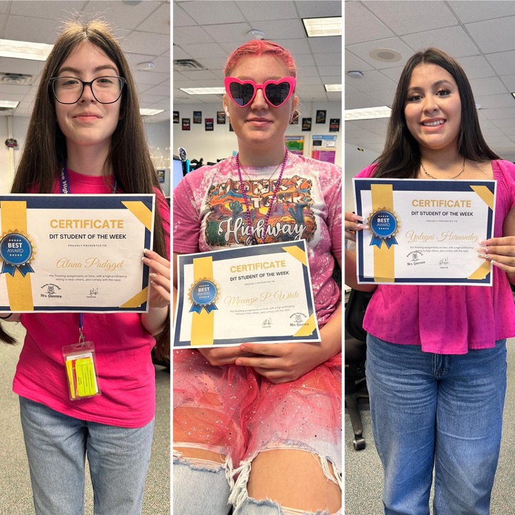 three girls holding certificates