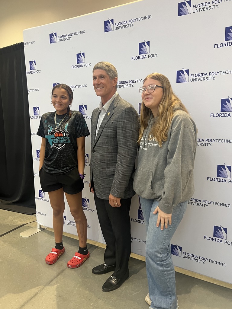 congressman with two students