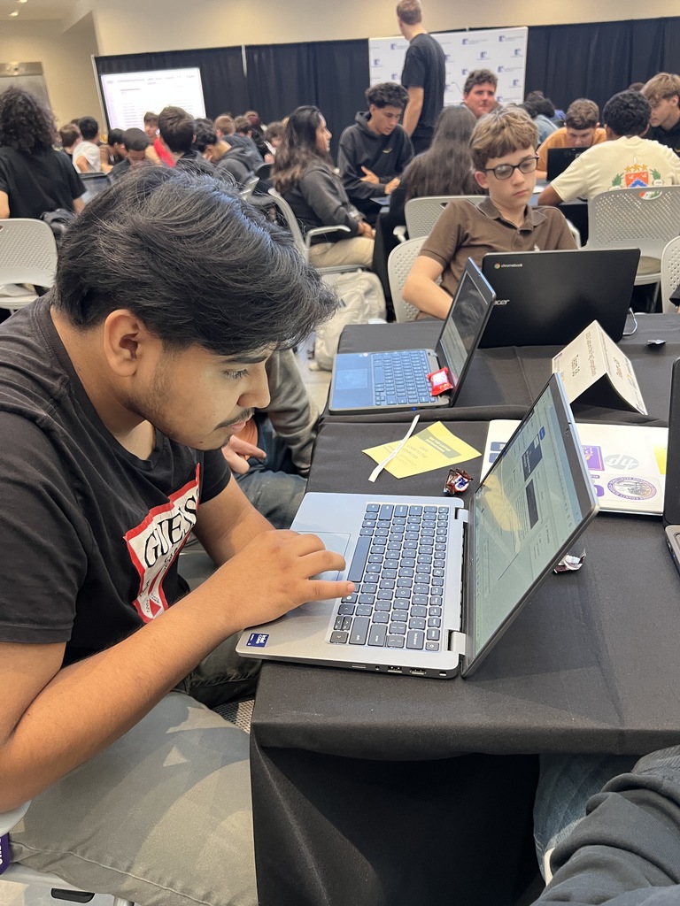 students working on cyber competition