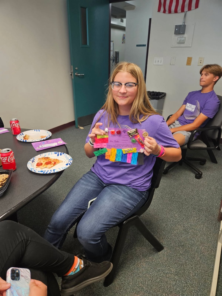 one girl holding certificate