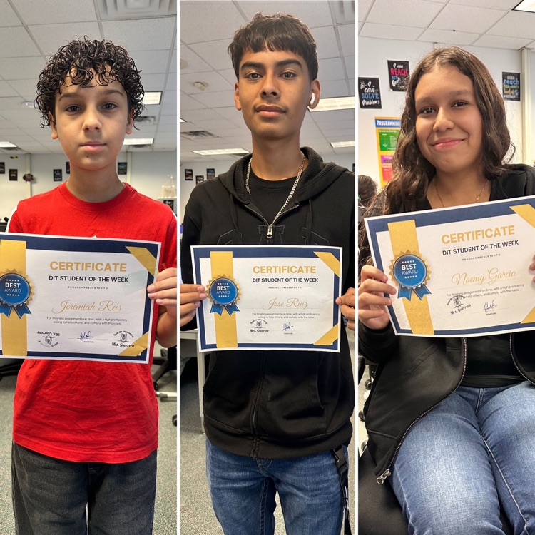 three students holding certificates