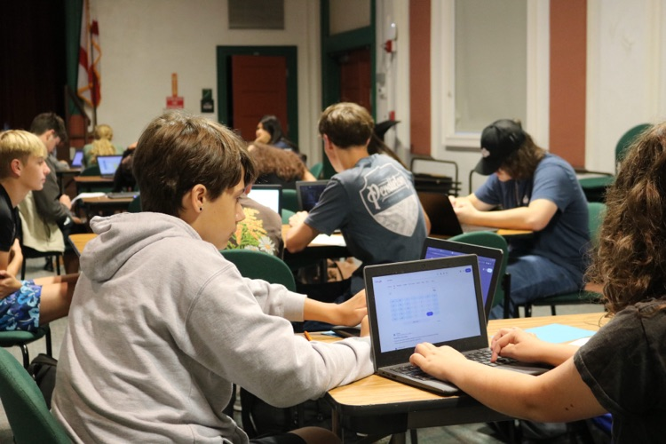 students calculating their semester grades