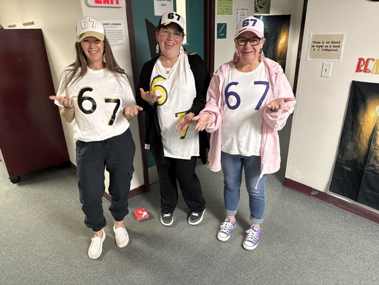 three teachers dressed as 6-7 for Halloween