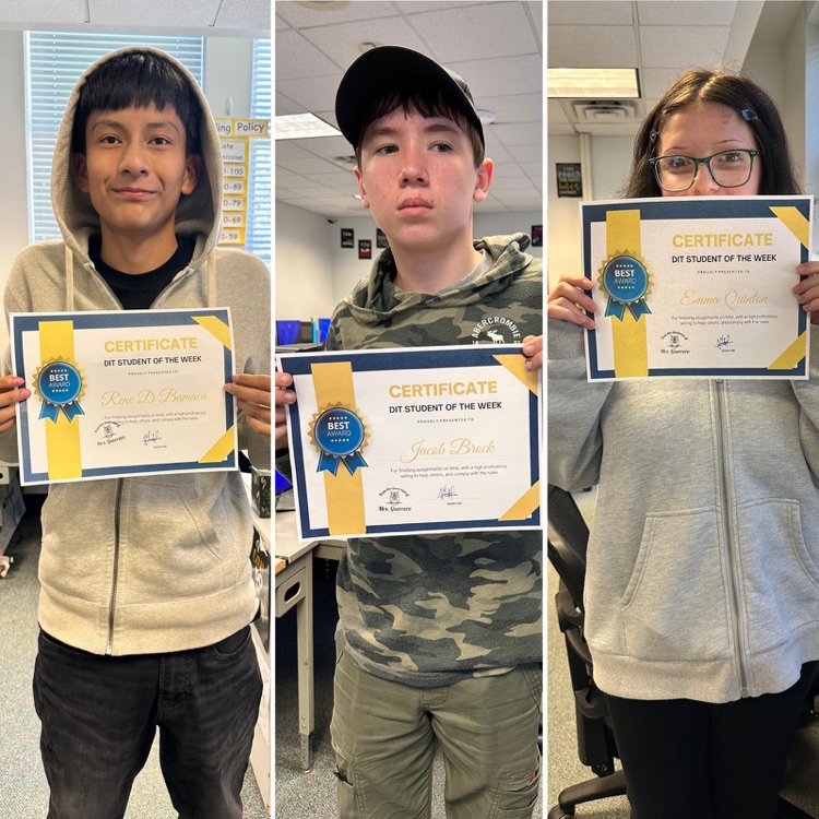 three students holding DIT certificates