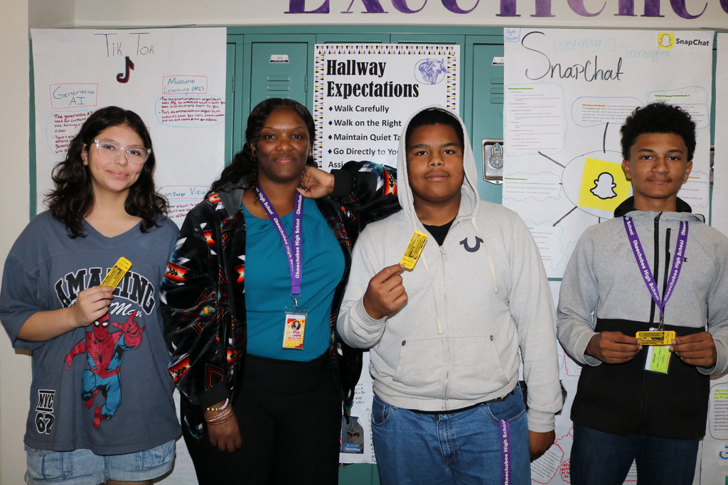 guidance counselor with three students