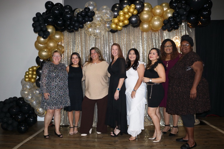 group picture of teachers at banquet